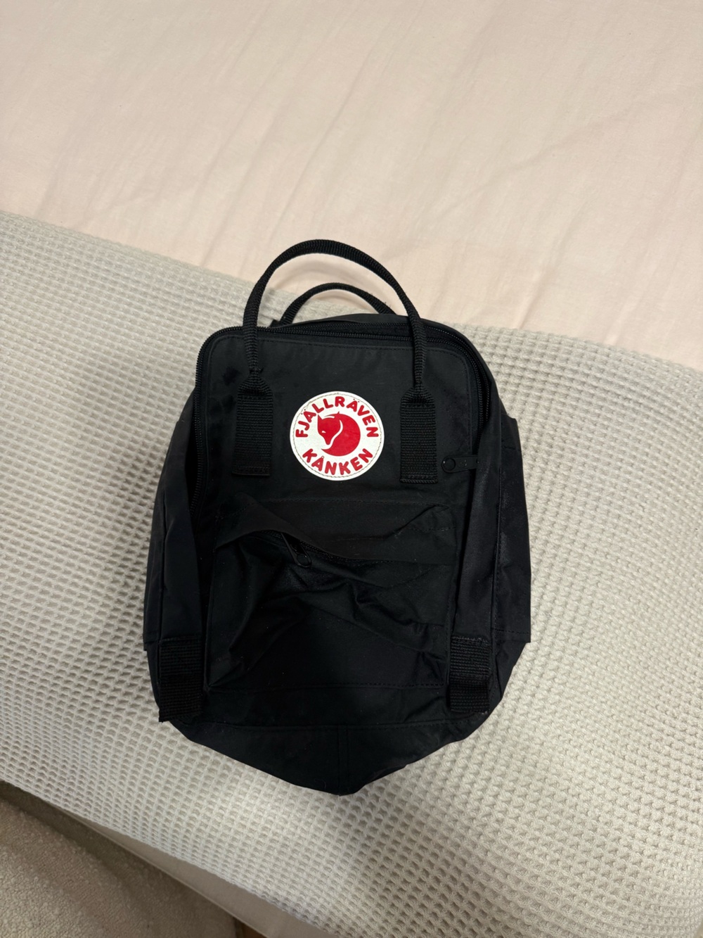 Fjallraven Kanken Mini Backpack in Black with Red Logo